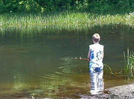 Boy Fishing in the Creek at Crown Point
